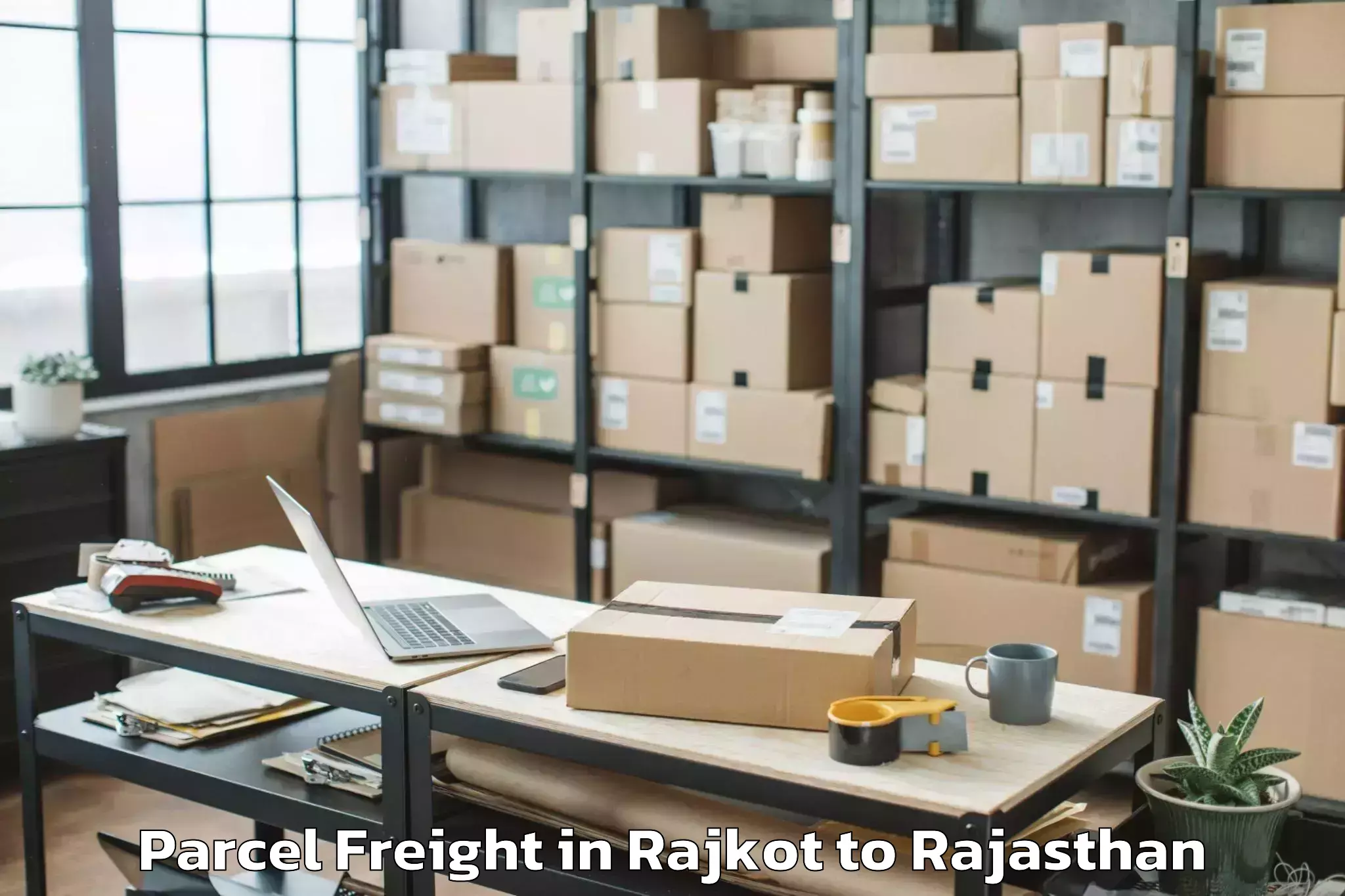 Professional Rajkot to Baswa Parcel Freight